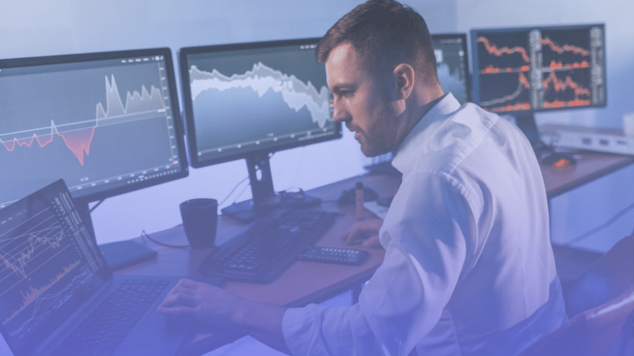 Trading strategies. Stock trader working in the office with exchange technology